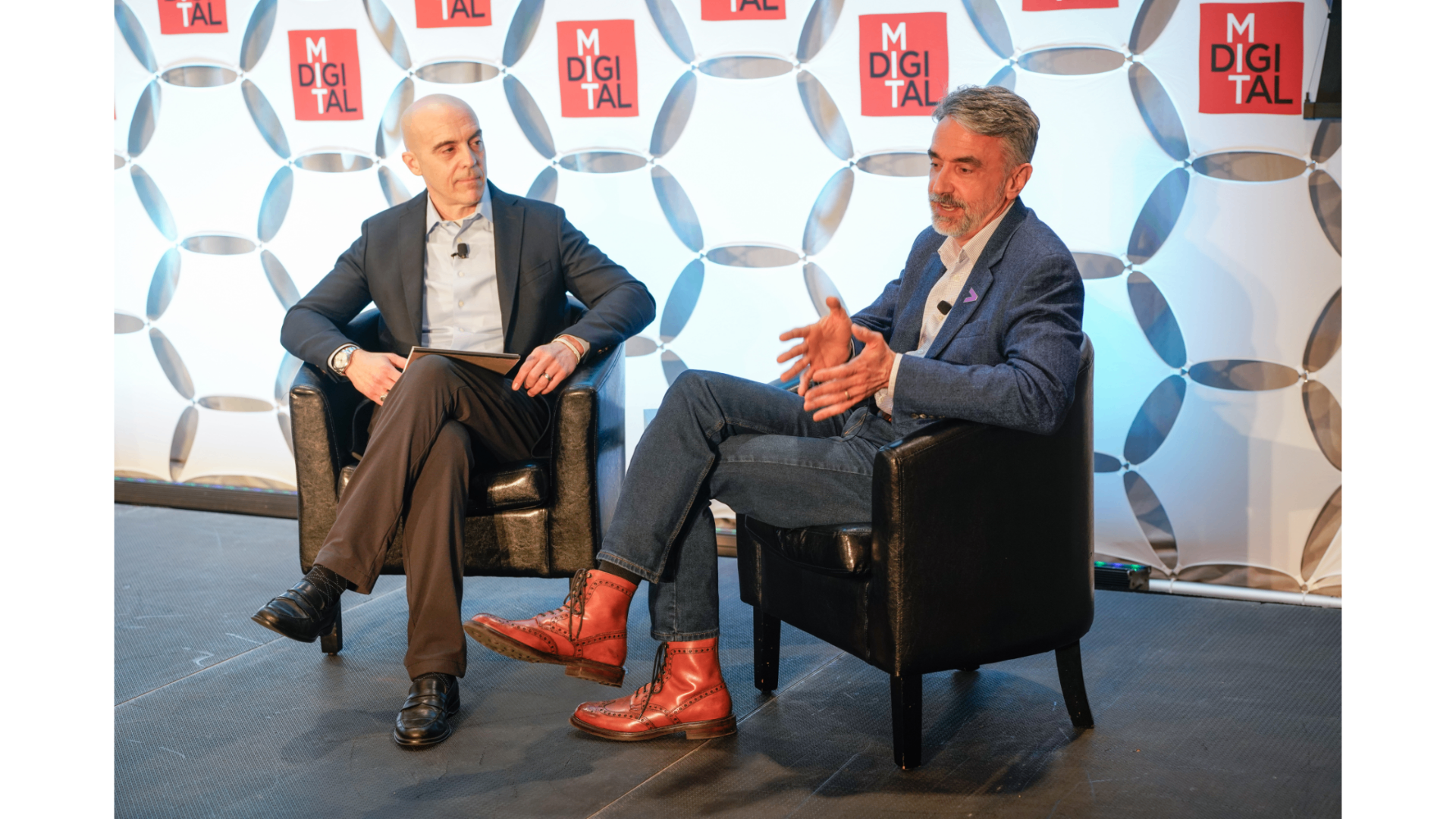 Sinan Aral and Kenneth Munie in conversation on stage during the MIT IDE 2026 Fireside Chat
