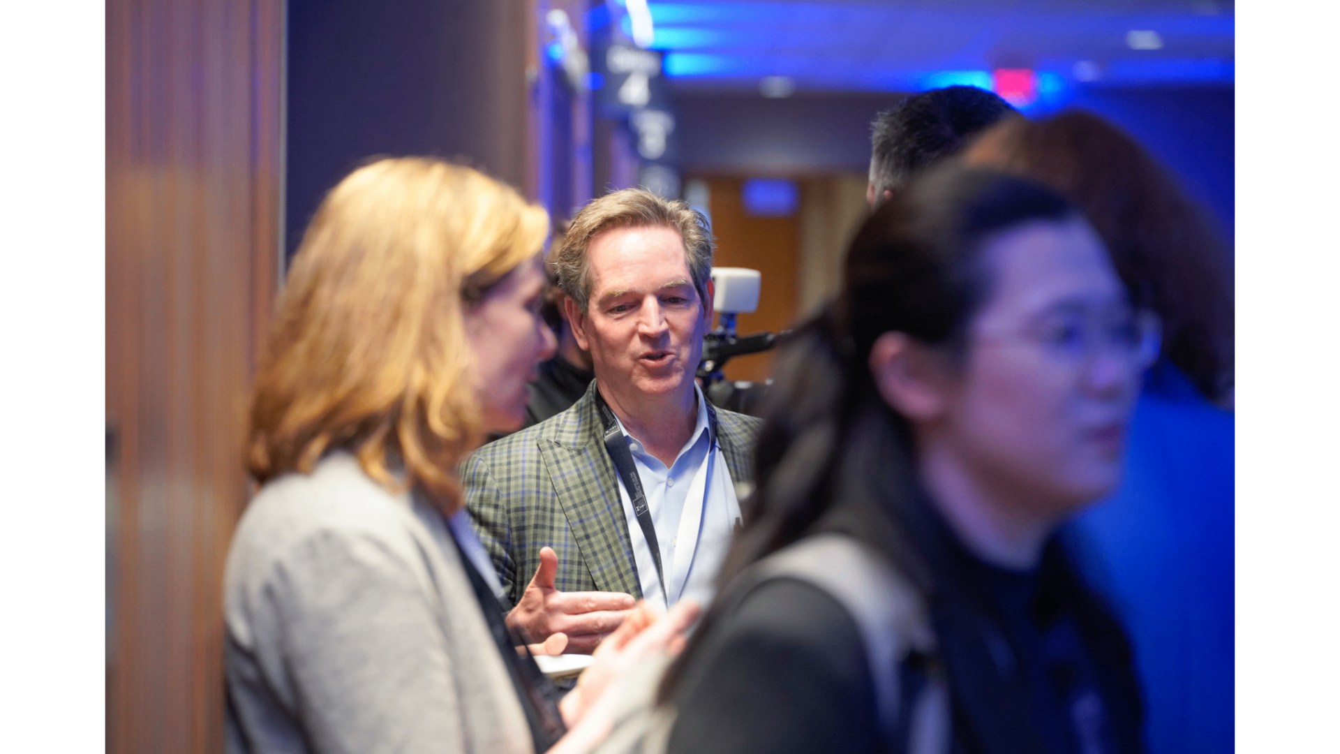 Conference attendees in conversation between sessions at the MIT IDE 2026 Annual Conference